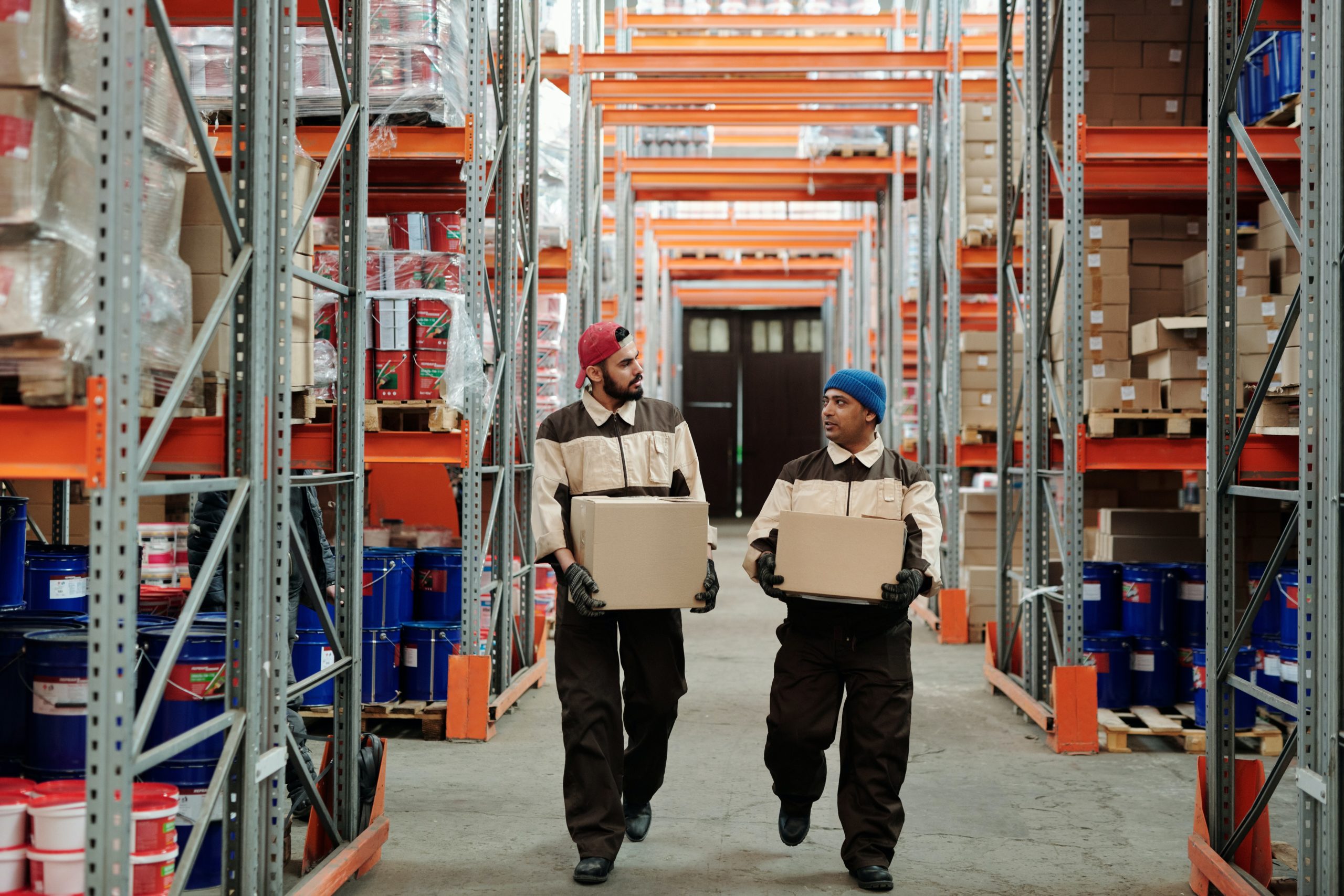 Two team members working on perishable items in a warehouse