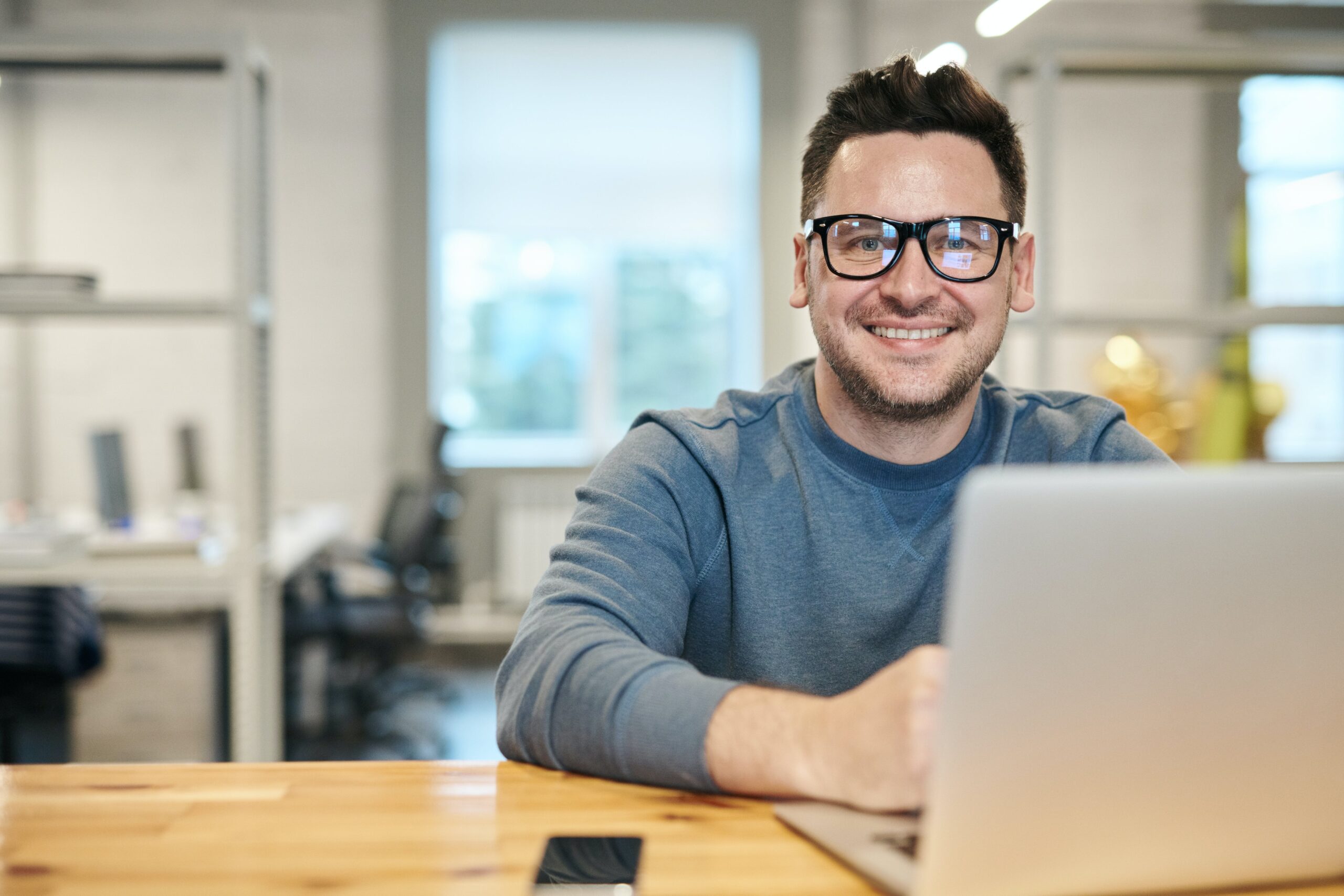 Business owner delightedly realizing the benefits of QuickBooks Enterprise