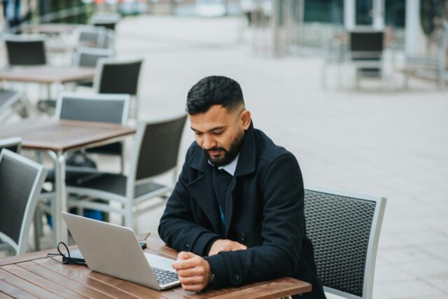 Business owner checking out the four versions of QuickBooks Enterprise