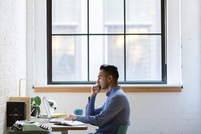 Businessman comparing QuickBooks Online and Desktop