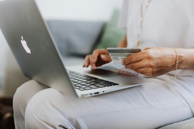 Person shopping online using their credit card