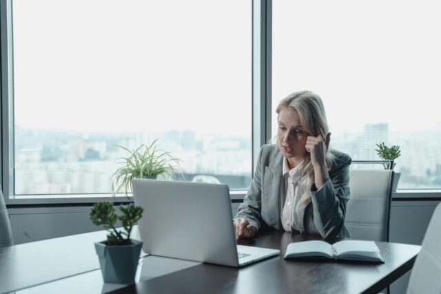 Woman checking out the features of QuickBooks Enterprise Diamond