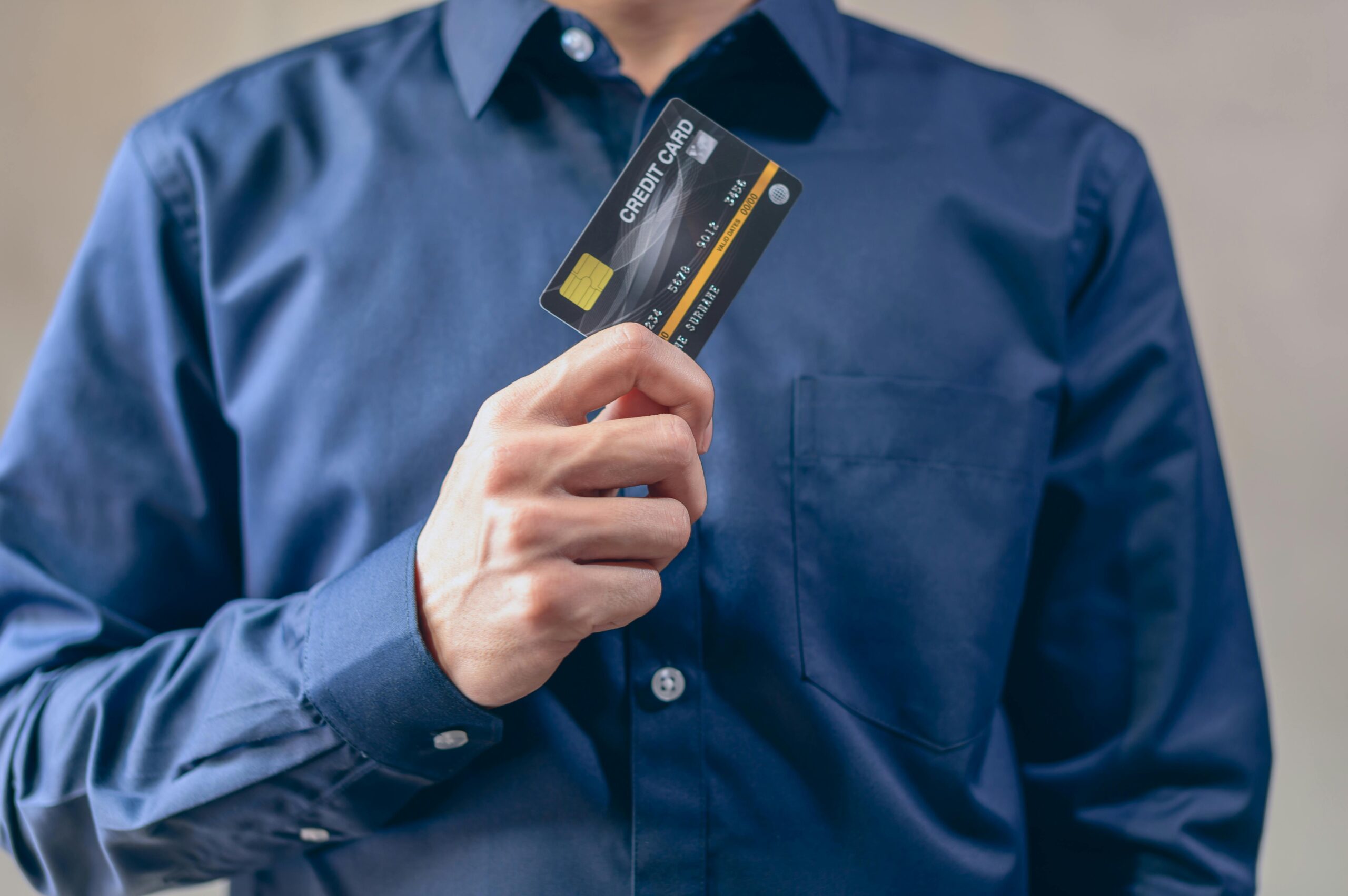 Someone holding a credit card