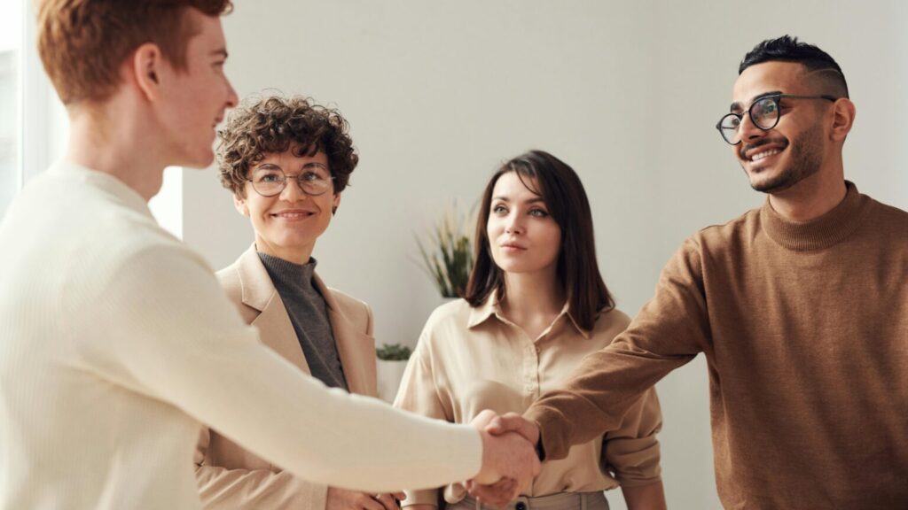 QuickBooks reseller shaking hands with a customer