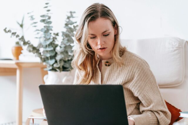 Businesswoman exploring the QuickBooks accounting suite