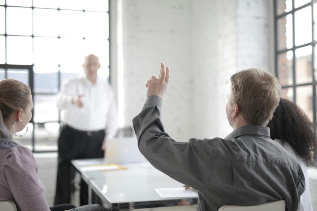 Reseller raising hand to ask presenter about QuickBooks reselling