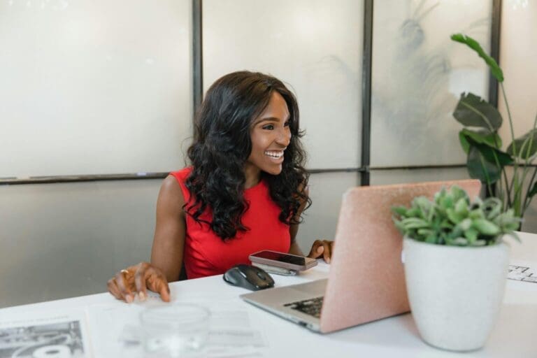 Business owner delightedly checking out QuickBooks Online Payments