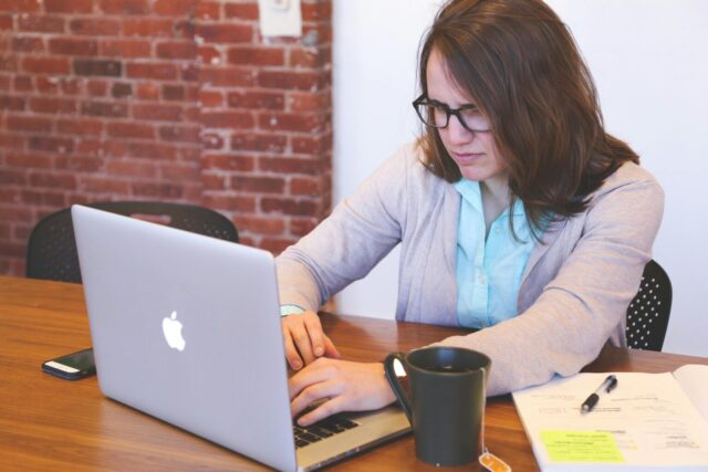 Woman checking out QuickBooks Enterprise Silver