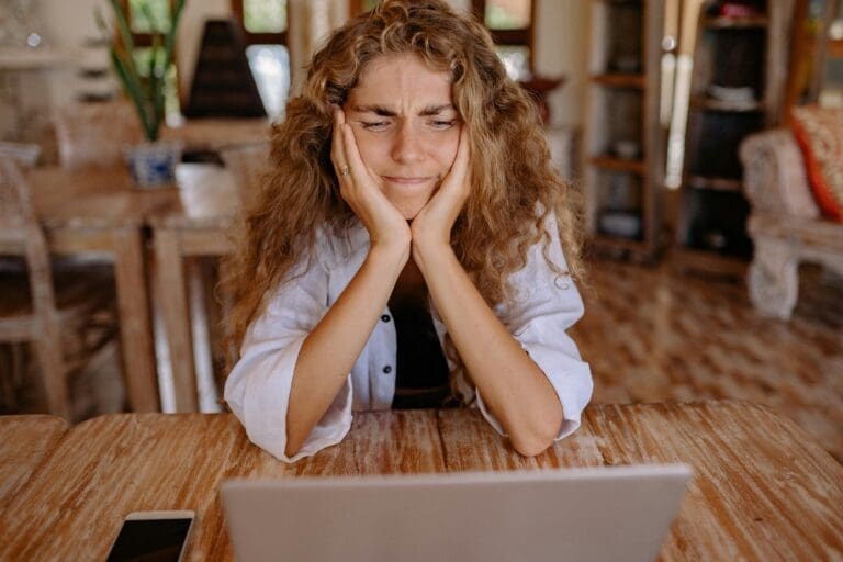 Businesswoman deciding between QuickBooks Online Advanced and Enterprise