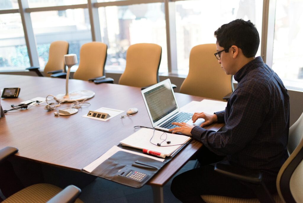 Businessman exploring QuickBooks Online plans